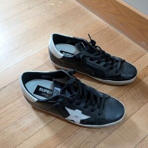 Golden Goose Black and White Sneakers with Star Accent